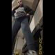 Miss Marilyn squats with her pants down under outdoor concrete stairs. No pooping shown. Presented in 720P vertical HD format. About a minute.